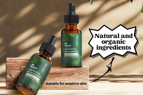 Mayraki CopperGro Pro Beard Growth Oil Two amber dropper bottles of Mayraki CopperGro Pro Beard Growth Oil are displayed on wooden blocks against a warm, sunlit background. Labels highlight that the oil is natural, organic, and suitable for sensitive skin, aligning with winter beard care benefits like hydration, itch relief, and strand softening.