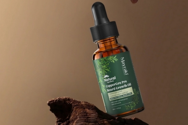How This Pairs with Mayraki CopperGro Pro Beard Growth Oil Mayraki CopperGro Pro Beard Growth Oil resting on a piece of bark against a warm-toned background, representing how incorporating nourishing products supports the role of regular beard grooming for healthier, well-maintained facial hair.