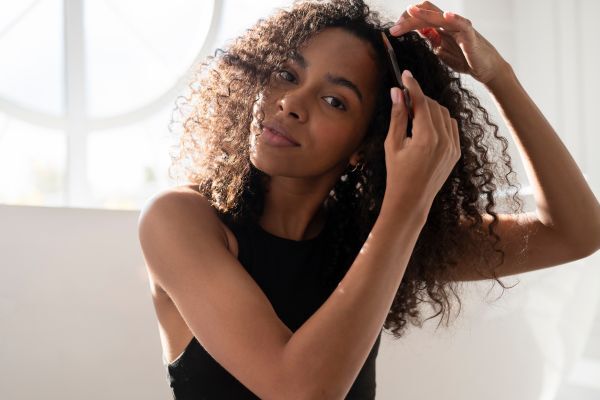 How to Moisturize Coily Hair Without Making It Greasy